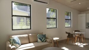 Aquarius Studio – Sofa and garden windows